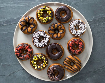 Wholemeal spelt doughnuts with cacao glaze